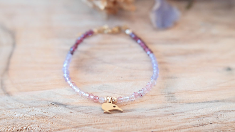 bracelet Made with a trio of tiny natural semi precious gemstones - Strawberry quartz, Amethyst and Rhodolite Garnet with our Secret Fern designed Kiwibird charm. 