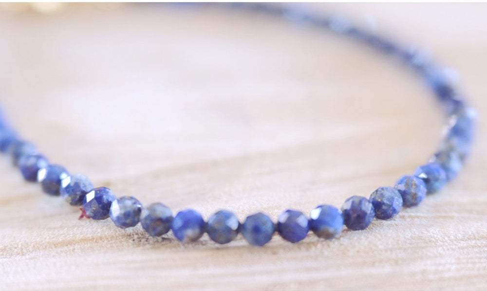 
            
                Load image into Gallery viewer, close up of a  3mm  Lapis Lazuli gemstone bracelet made with high quality hypoallergenic surgical steel and 14k gold filled beads
            
        