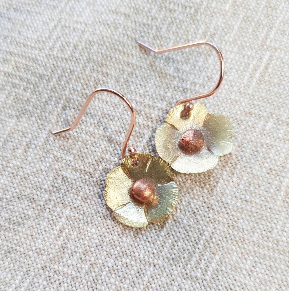 
            
                Load image into Gallery viewer, Mixing Copper and Brass flowers with Rose Gold plated Sterling Silver hooks.  These are around 3 cm long. 
            
        