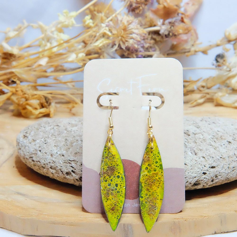 green and yellow spear polymer clay and resin earrings