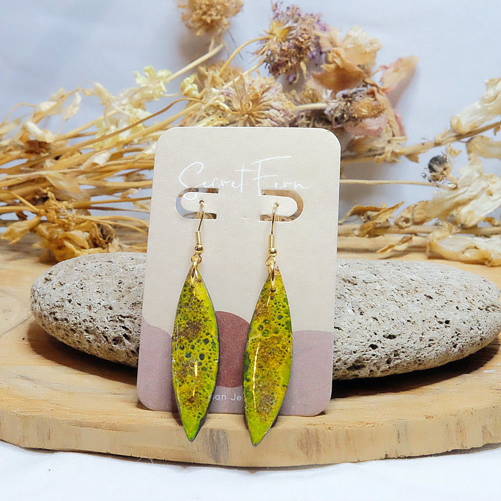 green and yellow spear polymer clay and resin earrings
