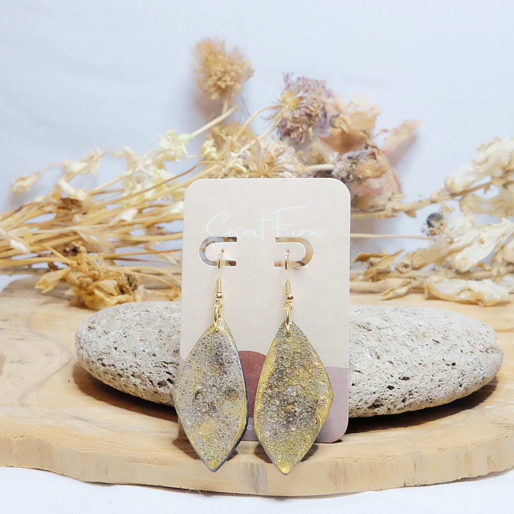 
            
                Load image into Gallery viewer, golden drop polymer clay and resin earrings
            
        