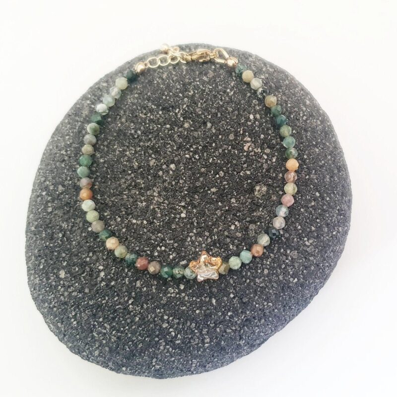 Indian Agate gems have the brown and green tones of nature. These are lovely stones. We added an authentic Swarovski crystal star to add a touch of sparkles! This dainty bracelet is lightweight yet elegant. Wear it anytime, anywhere - Solo or stack it with our other styles!