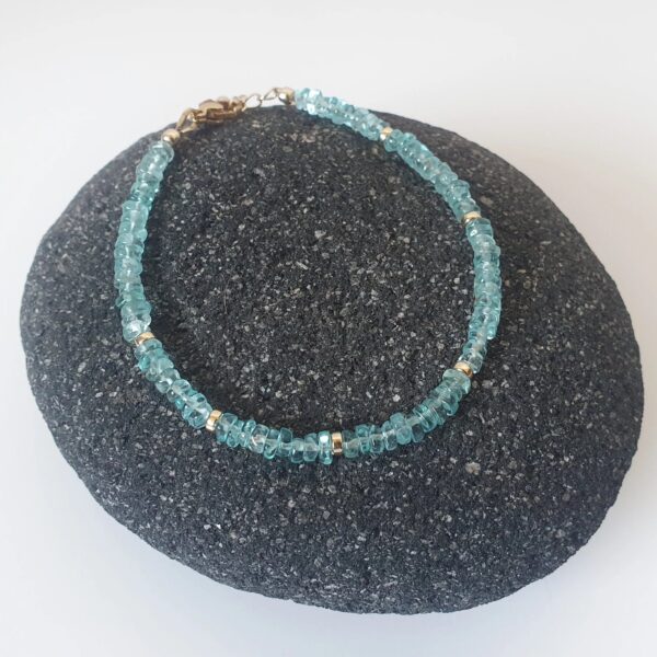 Dive into the blue-green hues of Apatite, what an uplifting colour!  This bracelet is made of 4mm dainty Apatite gemstones with findings in 14k Gold Filled and Surgical Steel - perfect for sensitive skin.  Discreet yet sparkly, we love how elegant this bracelet is! It is also lightweight, so you can wear it anytime, anywhere.  Try mixing and matching it with our other gemstone bracelet styles to create a stacking effect.