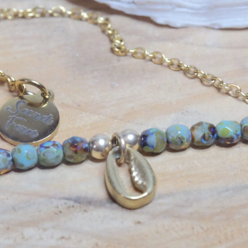 DSCF2883 Conch charm anklet on a Gold plated surgical steel chain, tortoise hand fired rustic glass beads, rhinestone charm and gold filled findings.