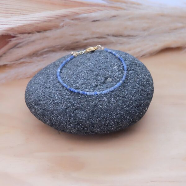 bracelet is made with micro natural denim blue sodalite gemstones and high quality hypoallergenic s. steel and 14K gold filled findings.