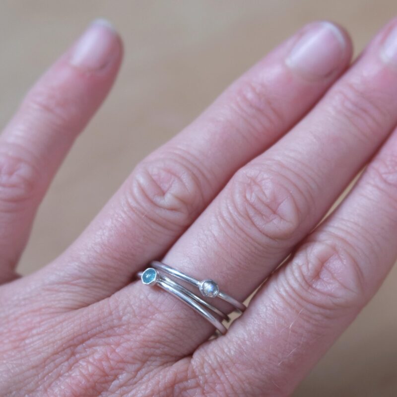 Light Blue tourmaline portee A minimalist sterling silver ring with a natural 3mm light blue tourmaline.