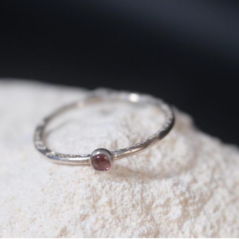 Pink tourmaline side A minimalist sterling silver stacking ring with a natural 3mm pink tourmaline.
